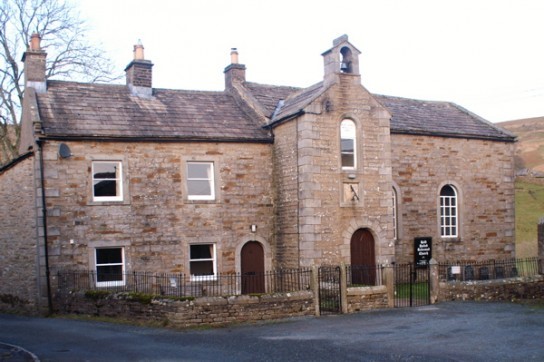 A generic square placeholder image with rounded corners in a figure.