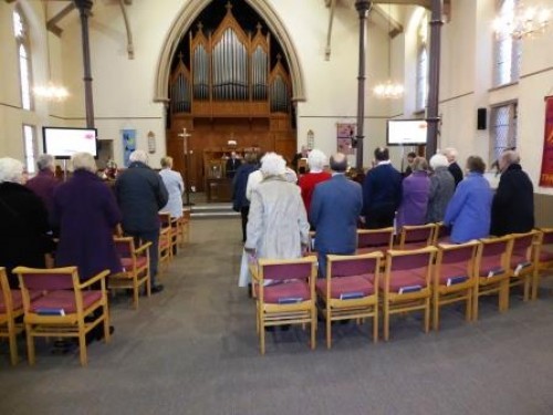 A generic square placeholder image with rounded corners in a figure.